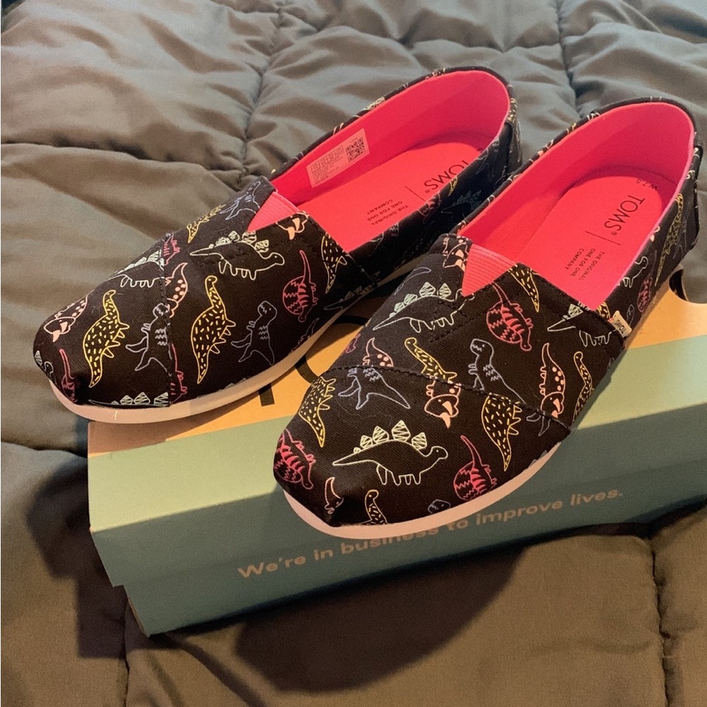 Discontinued TOMS alpargata black outlined Dino Doodles Glow in the dark print